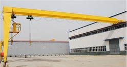 BMH Warehouse Outdoor Traveling Half Gantry Bridge Crane for Pipe Coil Lifting
